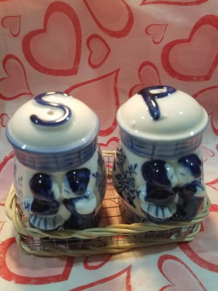 SALT AND PEPPER SHAKERS DUTCHMAN DESIGN--- WITH  WICKER TRAY