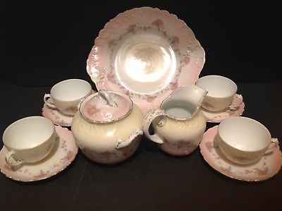 11 PCS ANTIQUE CARLSBAD CHINA AUSTRIA PINK WITH FLOWERS / YELLOW CENTER