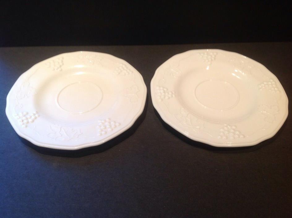 Two vintage milk glass saucers grape design.