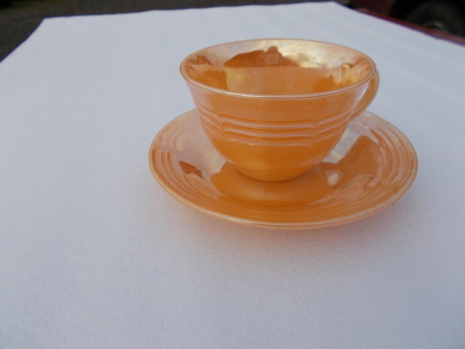 Fire King Tea Cup and Saucer. Orange with nice luster