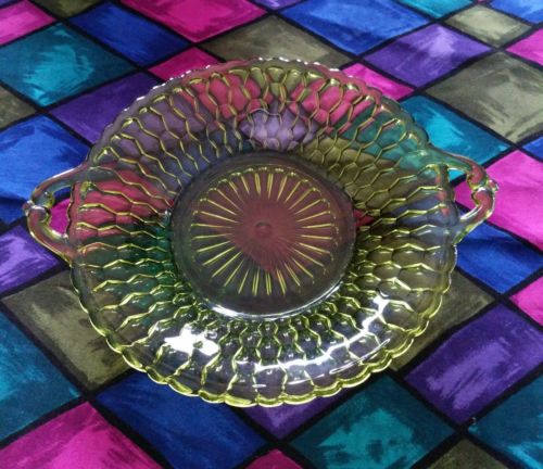 vintage green  glass plate with handles beautiful pattern 7.5