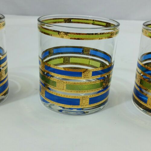 4 VINTAGE MID CENTURY BARWARE  gold blue and green colors
