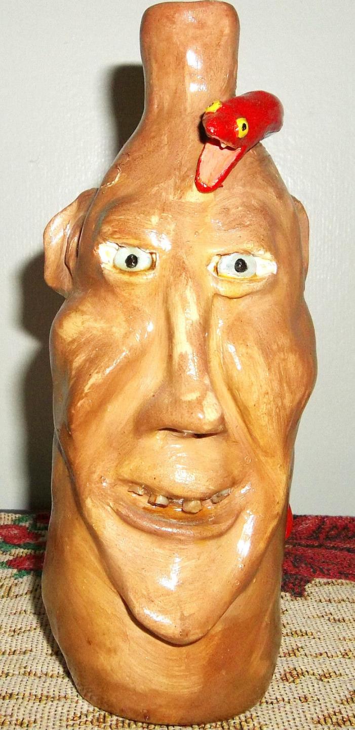 Snake Face Jug Handcrafted and Signed southern pottery