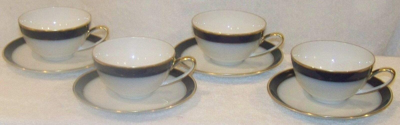 HUTSCHENREUTHER CHINA WHITE/COBALT FOUR COFFEE CUPS & SAUCERS