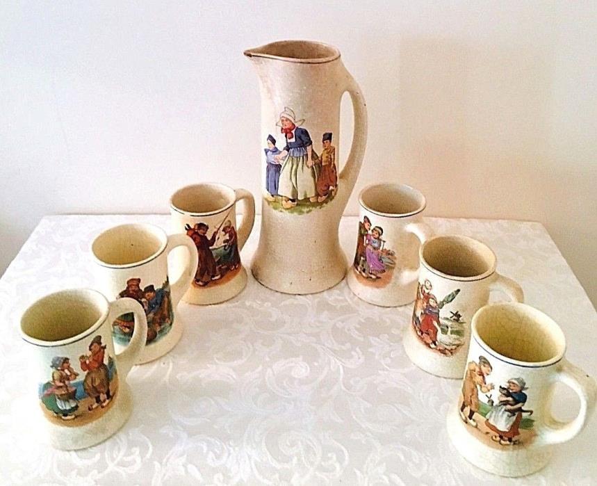 Knowles China Co Large Crackled Pitcher with Six Large Cups Dutch Family Scenes