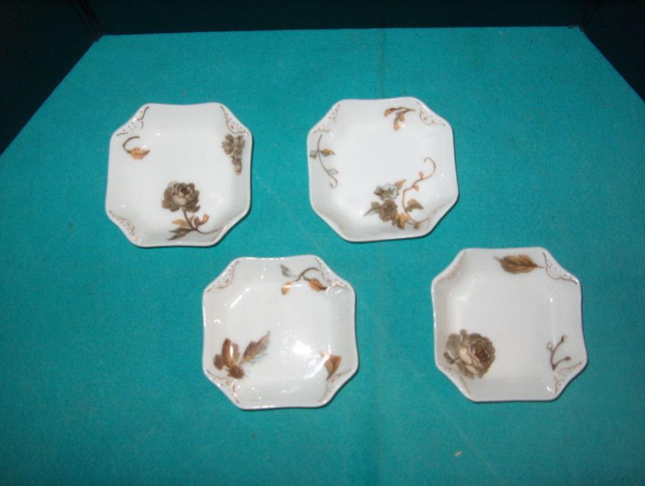 BUTTER PATS SET OF 4 HAVILAND & CO. LIMOGES H & CO. L  SIDED BUTTER PATS FLORAL.