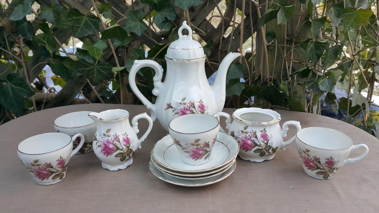 Vintage Japan Teapot Saucers and Demitasse cups with Gold Trim