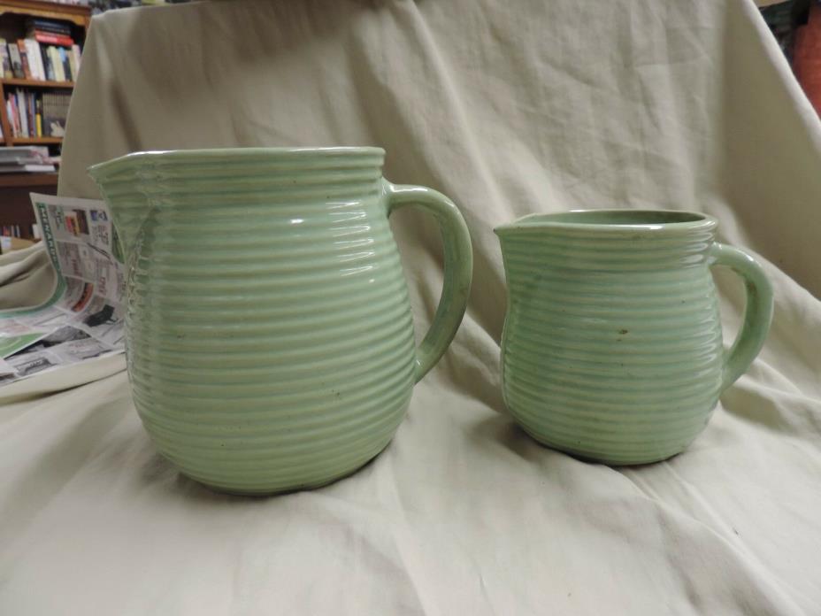 Two Vintage Western Stoneware Ribbed Pottery Pitchers Large and Small