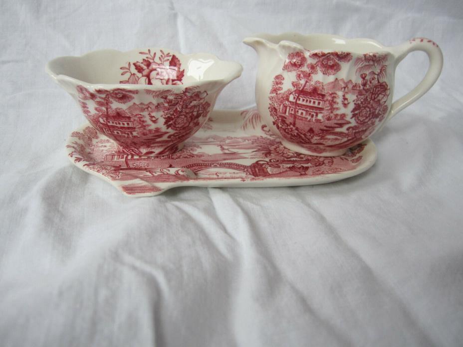 Tonquin, Royal Staffordshire Ceramics by Clarice Cliff, England, 3 piece red tea