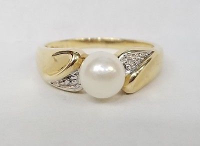.417 10K YELLOW GOLD CULTURED PEARL W/ .02 CARAT DIAMOND ACCENT RING