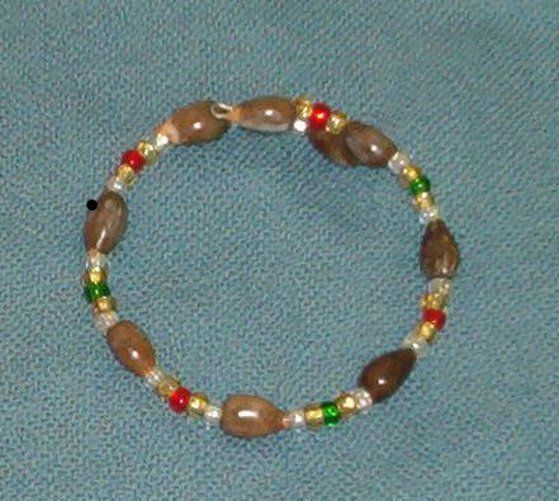Bracelet: Brown Hawaiian Job's Tears with silver lined seed beads red green gold