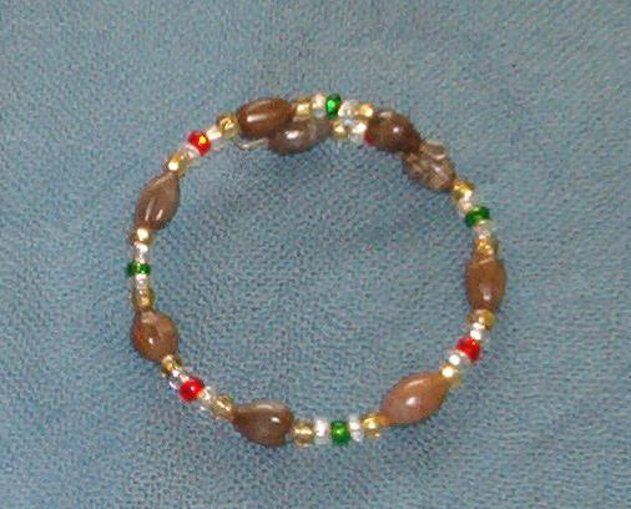 Hawaiian Brown Job's Tears bracelet with silver lined seed beads red green clear