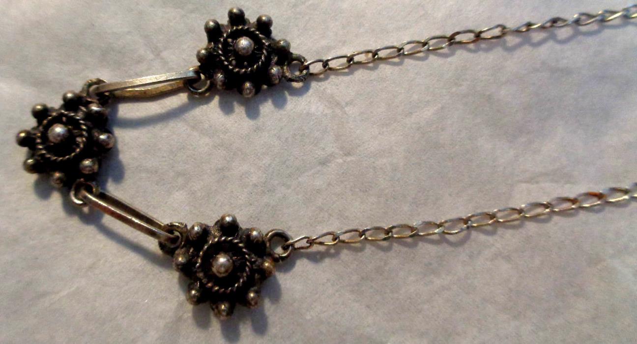 STERLING SILVER NECKLACE WITH THREE FLOWERS  IN FRONT 16'  CHAIN