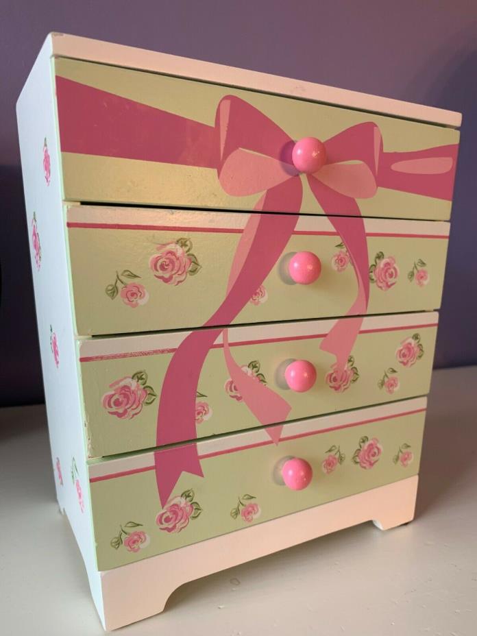 Gently used children's jewelry box - wooden with painted flowers; four drawers