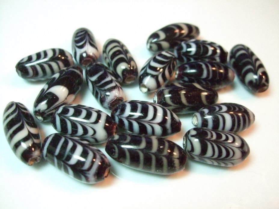 VINTAGE TRADE GLASS BEADS BLACK WHITE GLOSSY OVAL 18 TUBES 20MM X 8MM STRIPED