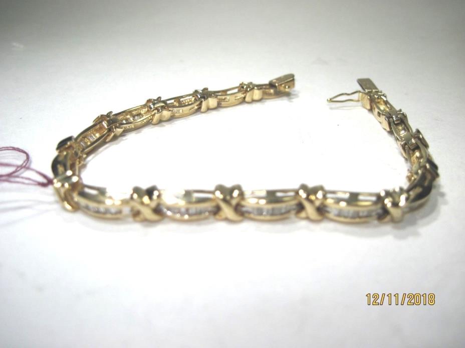 #5..14K Yellow Gold Tennis Bracelet with 1tcw Baguette Diamond....15.8gram