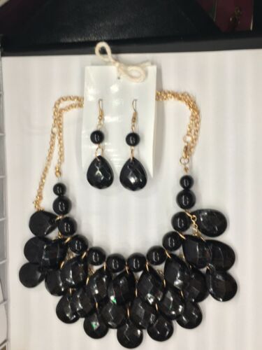 Black and Gold Statement necklace with matching earrings