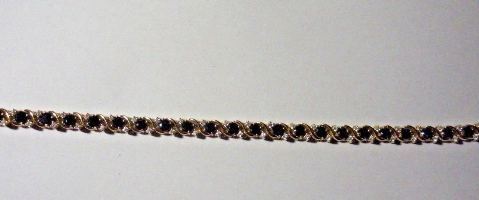 New sapphire and small zirconia gold over 925 silver bracelet  safety clasp 8