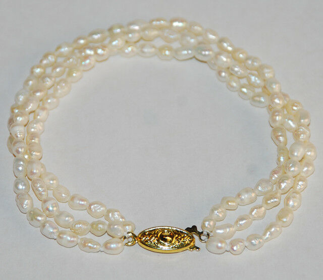 White Freshwater Cultured Pearl 3-strand bracelet with gold-tone clasp