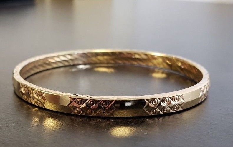 Brand New Pure 14K Gold Bangle bracelet. 6.4 inch long. 5 mm Wide. Very PETITE