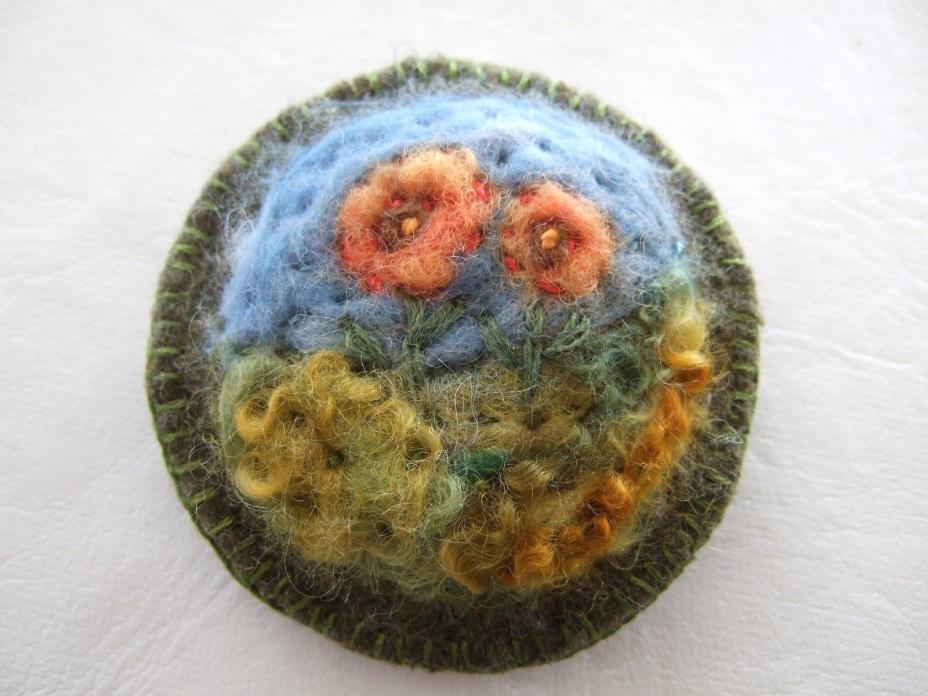 Pretty hand felted wool floral brooch