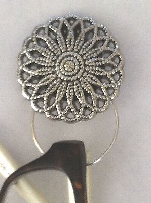 The mattie silver tone flower magnetic eyeglass holder