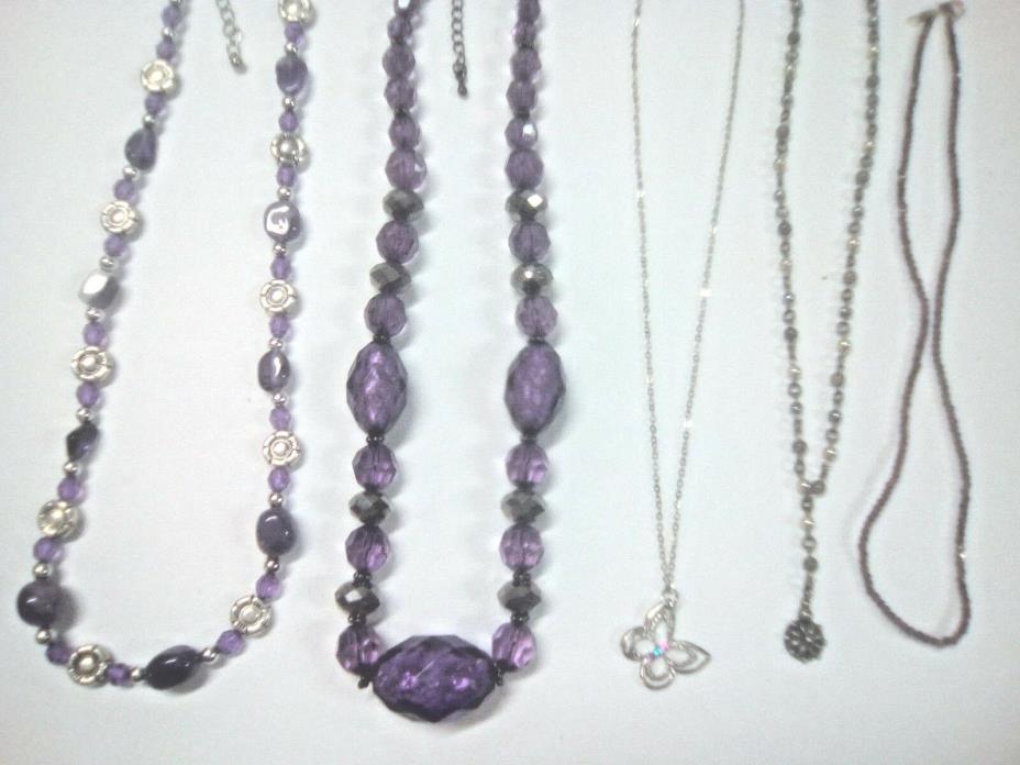 Purple necklaces. plastic and glass beads, butterfly pendant, 925 silver + more