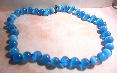 One strand of blue cats eye necklace 16.5 inches long and the beads are 6mm.each