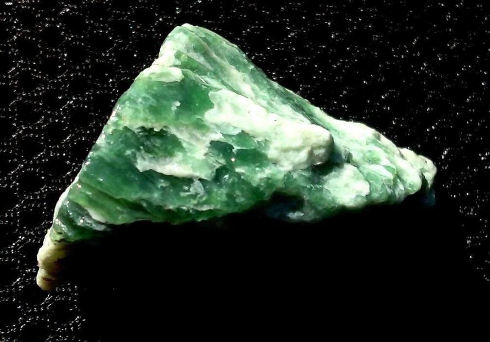Imperial Green Jade . Natural . Rough Stone . Translucent . 6-7 Moh Scale.