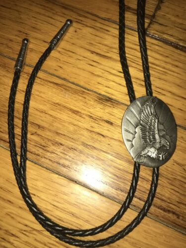 Siskiyou Buckle Co. -1987 Bolo Tie With Leather Strings and Pewter Flying Eagle