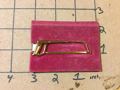 vintage original: HAND SAW - MONEY CLIP -- the wise buyer buys squire's