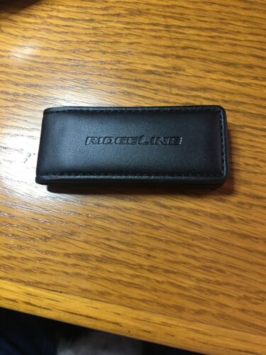 Nice new condition leather magnetic money clip