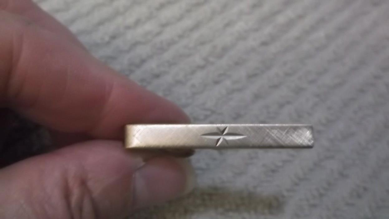 Vintage Swank Signed Textured Goldtone Tie Clip With An Etched Star