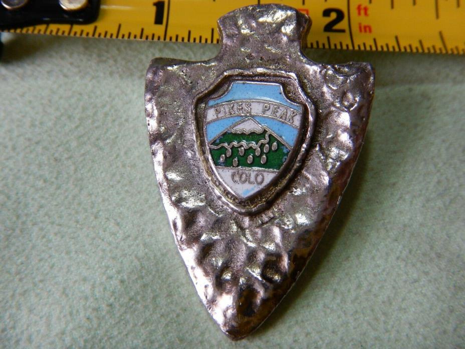 VINTAGE NON-STERLING ARROWHEAD BOLO TIE SLIDE ENAMELED SHIELD PIKES PEAK NICE!