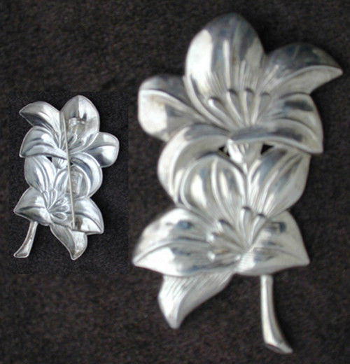 Sterling silver flower pin marked Lang circa 1945 vintage brooch jewelry