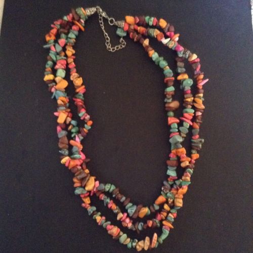 Triple strand colored polished rock necklace. turquoise?