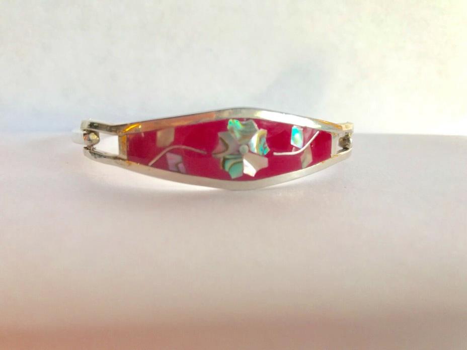 Vintage Mexican Silver Floral Abalone Inlay Bracelet with Fucia Red background