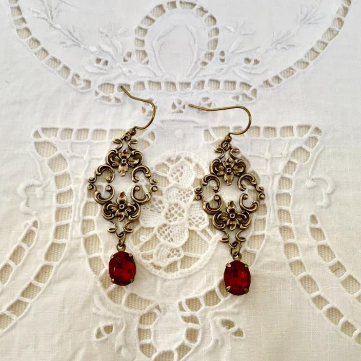 Vintage Swarvorski Crystals adorn Victorian French Baroque Filagree earrings.