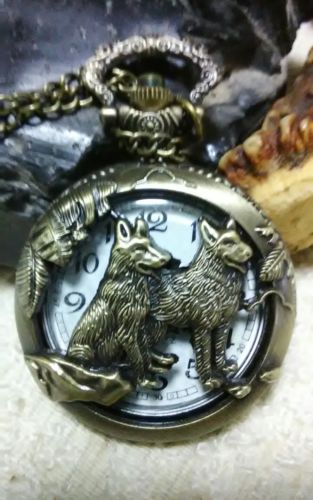 Beautiful Pocket Watch with Pair of Wolves Cut-Out Door