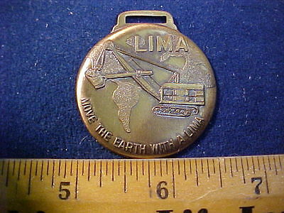 vintage and or used pocket watch fob Lima shovel