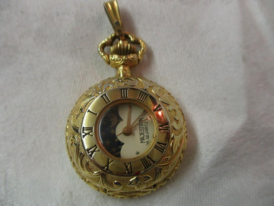 Vintage Majestron Quartz gold tone etched Pocket style Pendant Watch Moon Phase