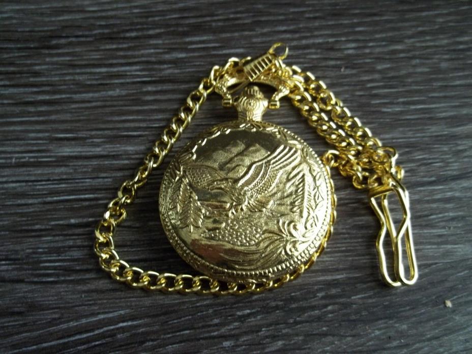 YELLOW METALLIC POCKET WATCH WITH EAGLE FACE