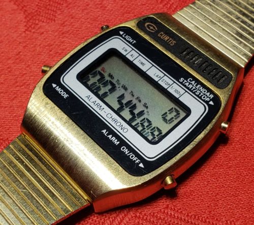 VINTAGE NOS 1980 LCD Slim WATCH Alarm Chrono Stainless Steel GOLD CURTIS