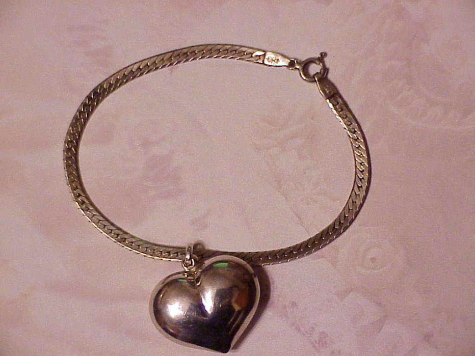 Nice, .925..Sterling Silver, With Heart Dangle  Charm Bracelet. 7 1/4 inches