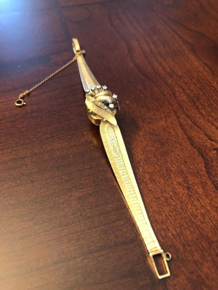 Vintage 14 k gold diamond ladies watch