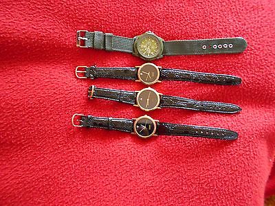 Group of 4 Quartz Watches with leather straps
