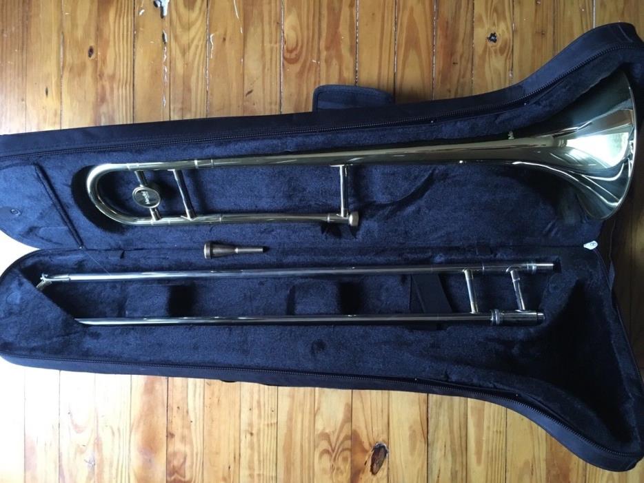 Trombone with case, cleaner and two mouth pieces used once from new