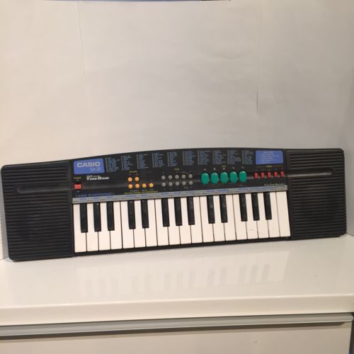 Casio SA-21 Electronic Keyboard Synthesizer 32 Key 100 Sound For Parts Or Repair