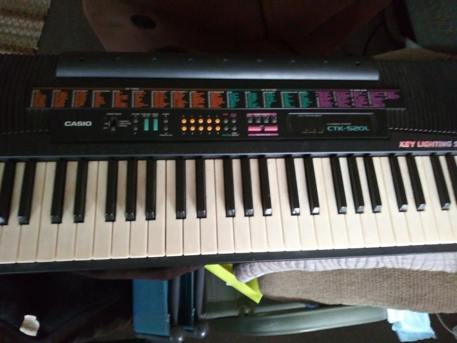 electronic keyboard, 61 keys, model ctk-520L. 40 song bank, need ac adapter.