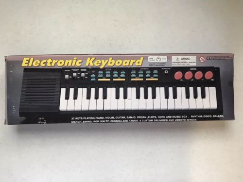 Electronic Keyboard; 37 Keys; Orchestra; Rhythm; Drummer; Battery Powered; NIB!